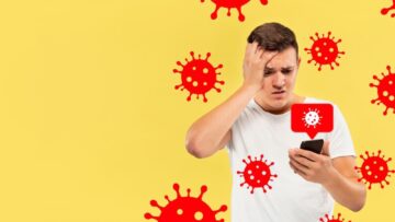 Homem com celular com vírus